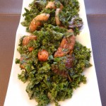 Vegan Kale Salad with Pomegranate Balsamic Marinated Figs and Dates Topped with Smoked Almonds