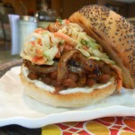 Vegan BBQ Bean Sandwich with Caramelized Onions and Fall Festival Slaw (with zucchini, apple, carrot and walnuts)