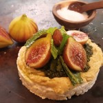 Vegan Ricecake Stack with Hummus, Pesto, Baby Greens, Fresh Figs, and Smoked Almonds