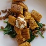 Vegan Butternut Squash Gnocchi with Browned Sage Butter, Wilted Greens and Roasted Pumpkin Seeds