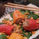 Mini-Bell Peppers Stuffed with Coconut – Cauliflower Risotto Served with Steamed Greens and Spicy Peanuts